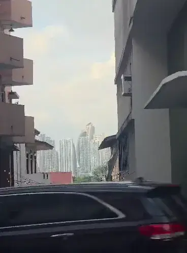 City streets, with the skyline at the end