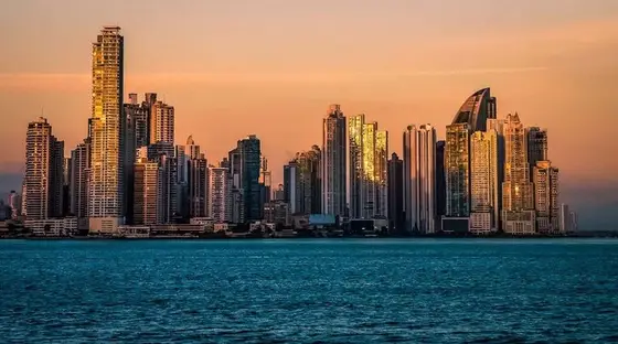 Panama City: the banking district skyline at sunset, seen from the bay