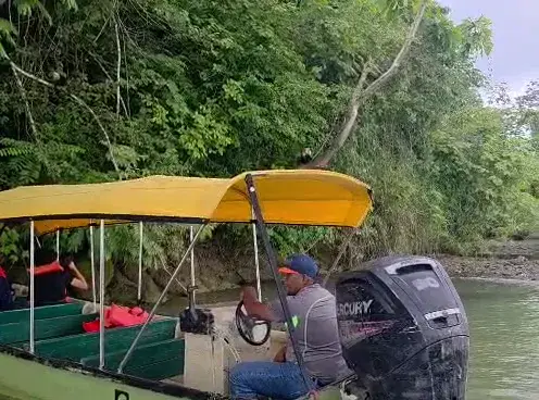 Boat and capuchins at Monkey Island
