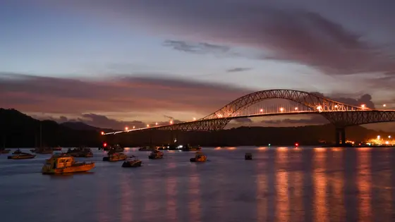 Bridge of the Americas, Panama, at sunset over the bay